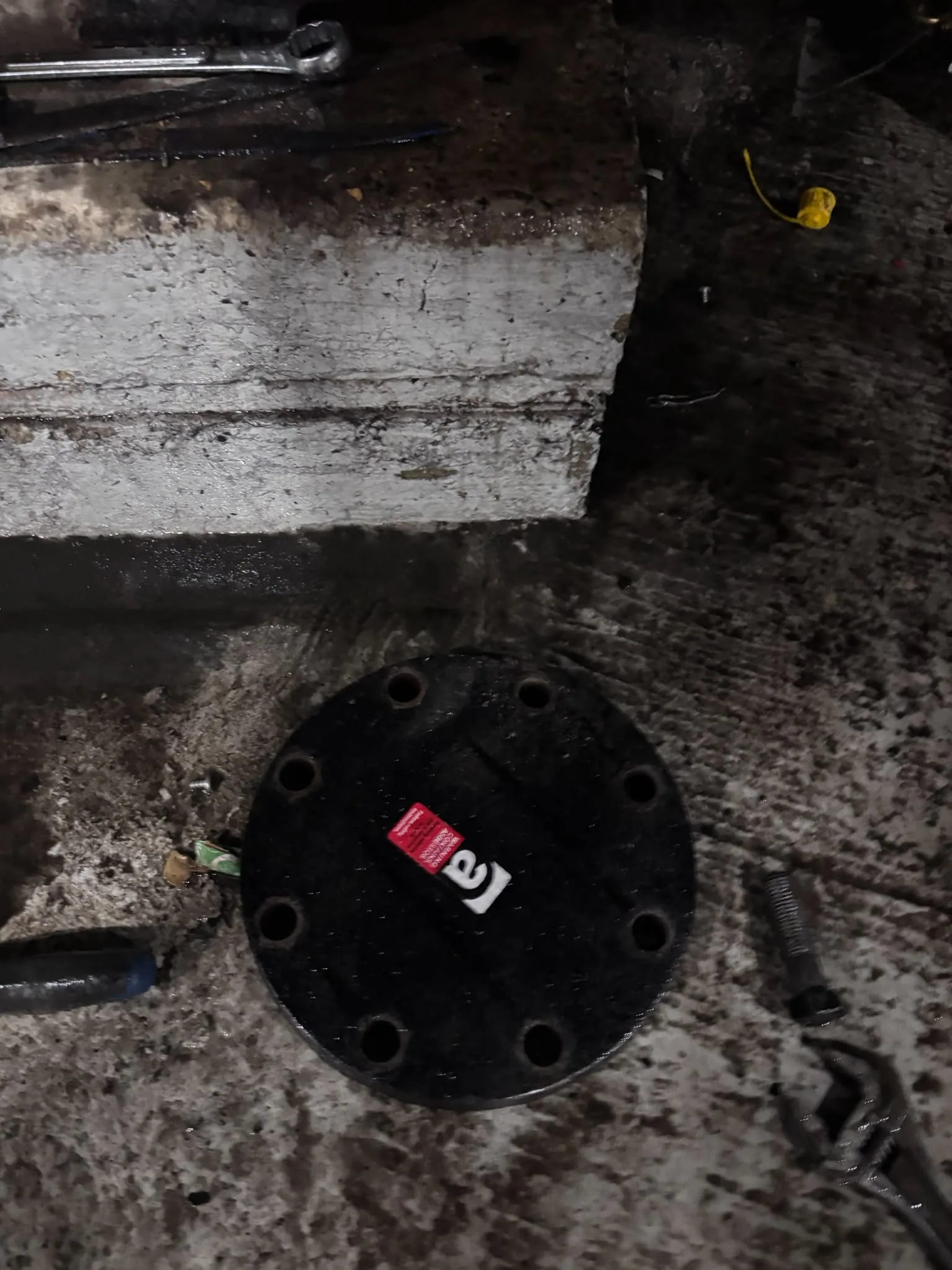 Artex scraping from a concrete ceiling during Clapham Junction refurbishment